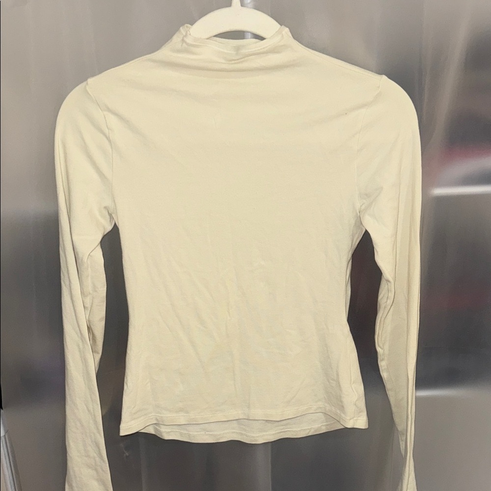 SKIMS Long Sleeve Mock Neck Top in Cream